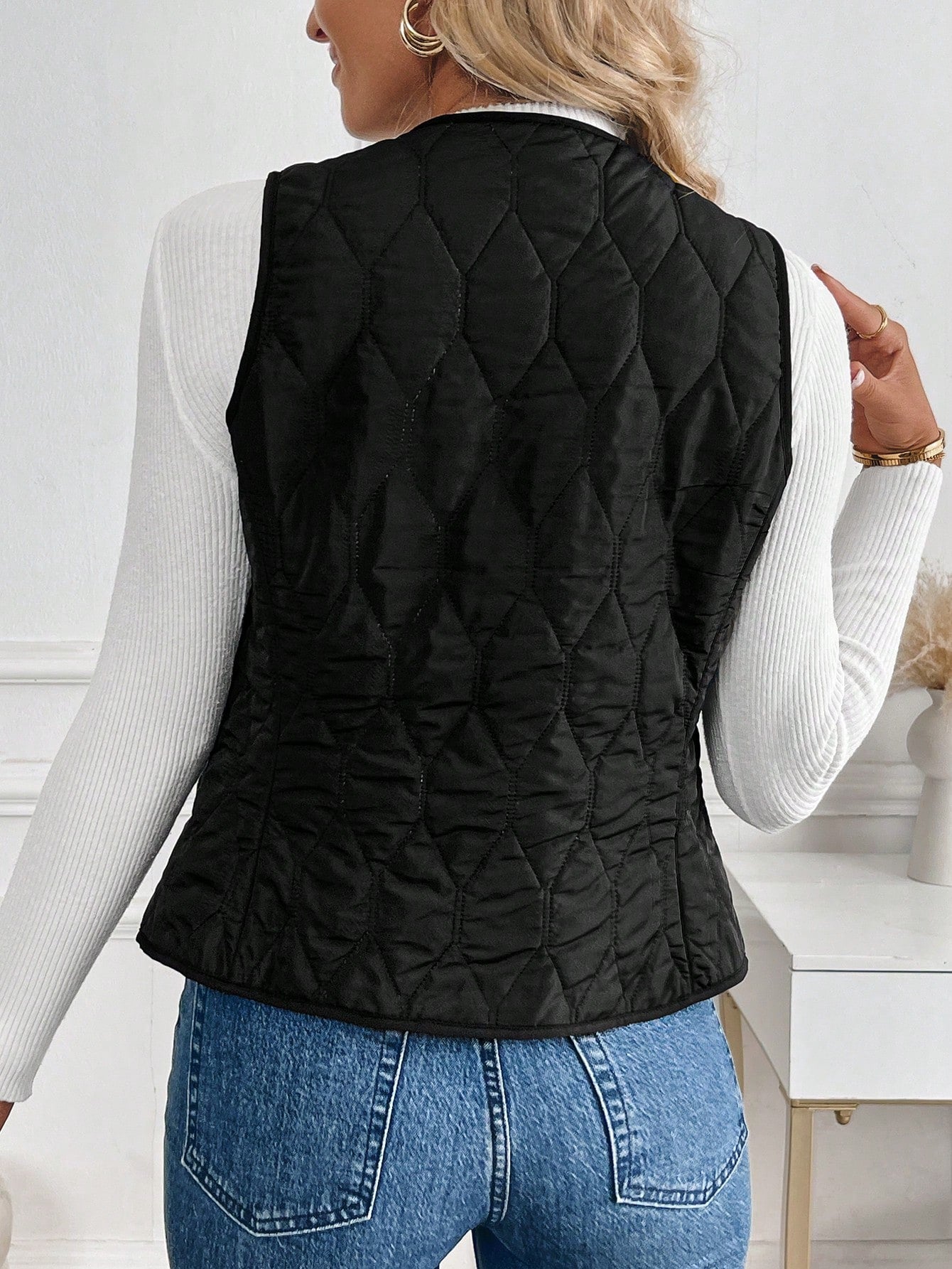lightweight button-down quilted vest