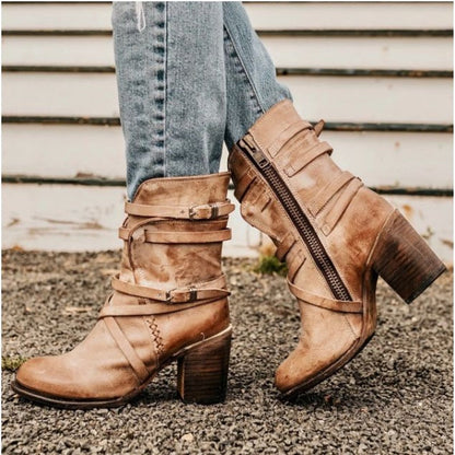 Women's distressed leather ankle boots with chunky heels and buckled straps