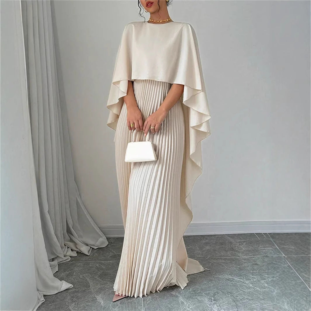 Robe longue fluide à col montant, manches chauve-souris et jupe plissée