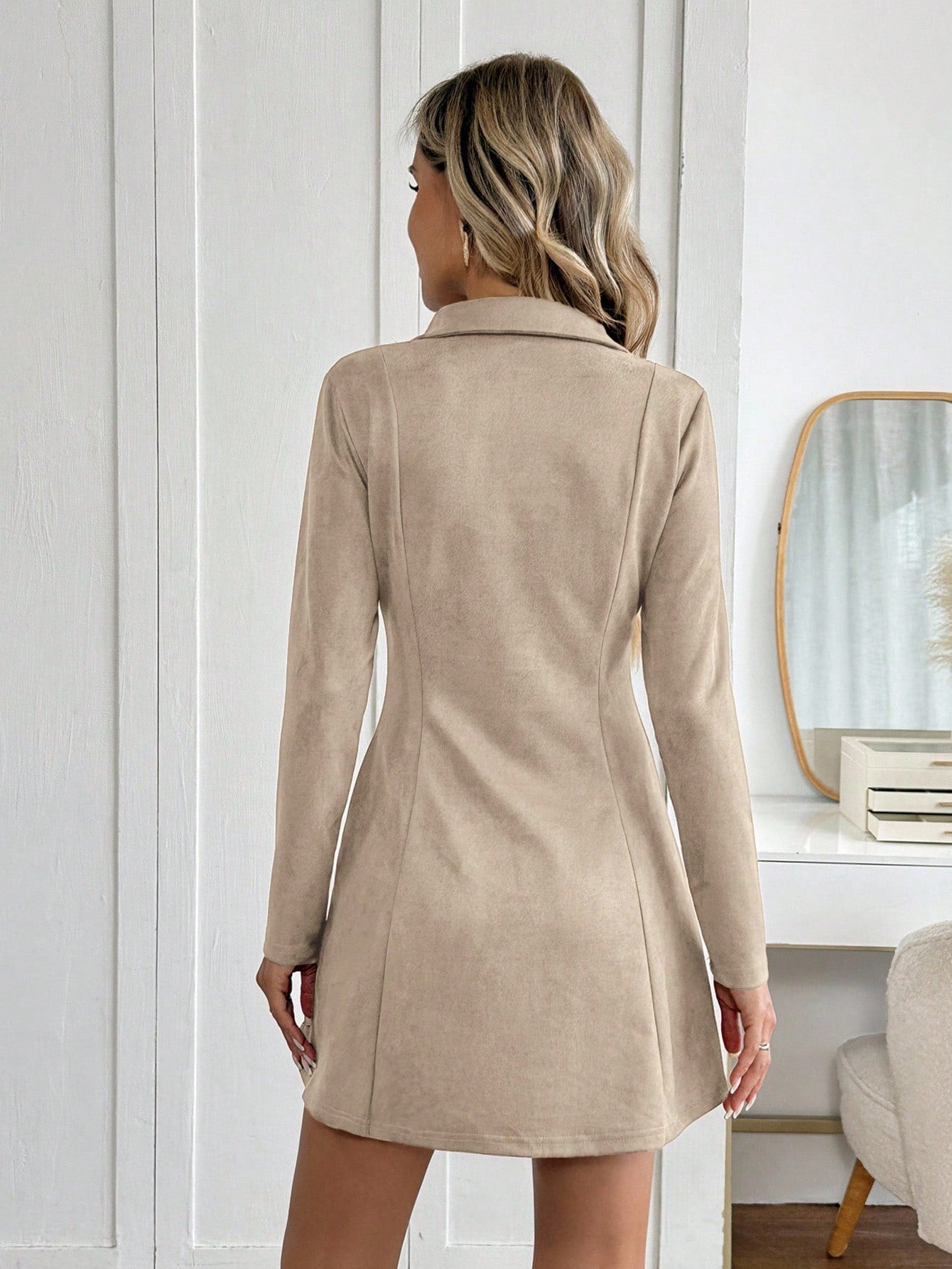 Women’s flared mini dress with V-neck and long sleeves, elegant office and casual wear by Nushes.