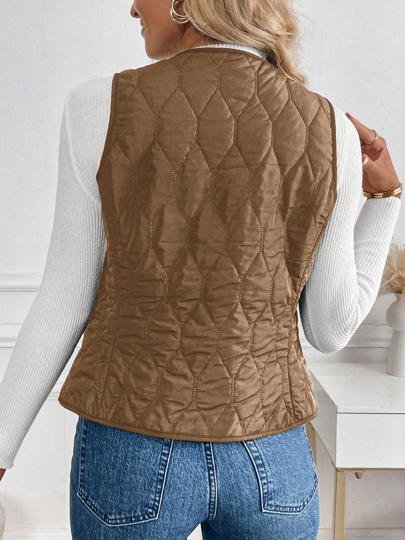 lightweight button-down quilted vest