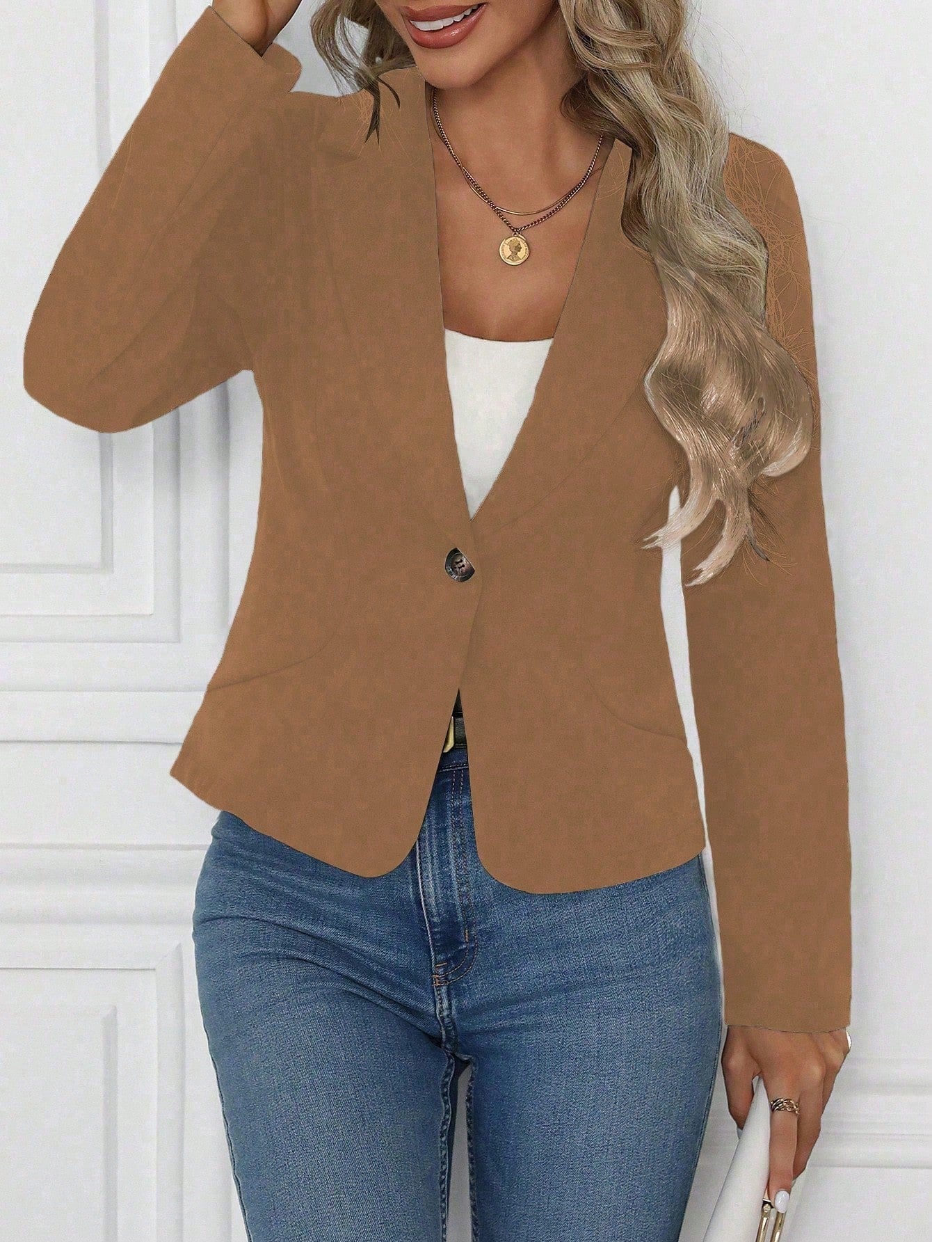 Women’s brown long sleeve blazer with single button and notched lapel, casual elegant office jacket by Nushes.