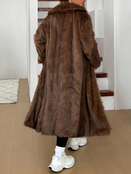 woman wearing long grey faux fur coat winter jacket Nushes 