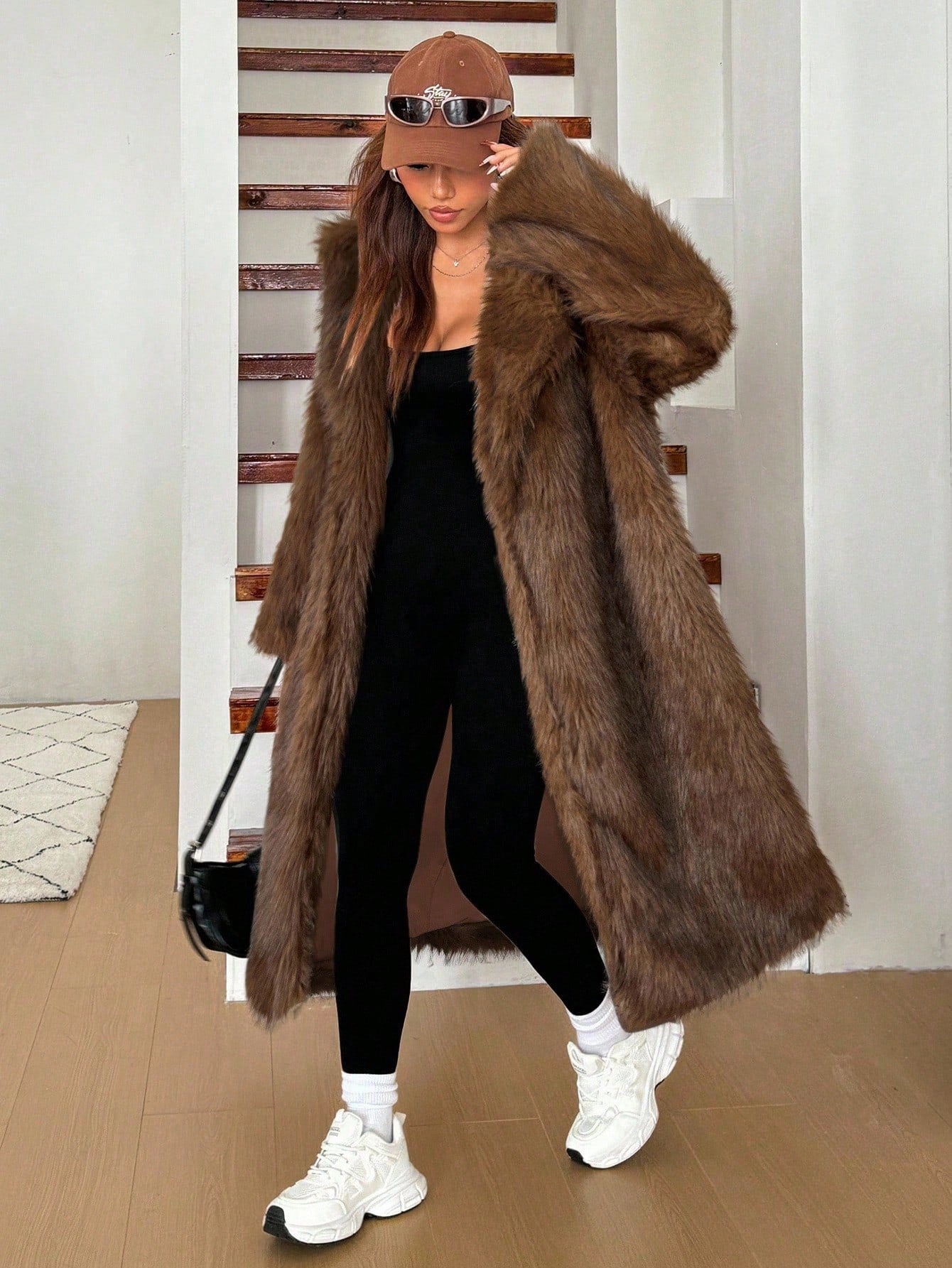 woman wearing long grey faux fur coat winter jacket Nushes 