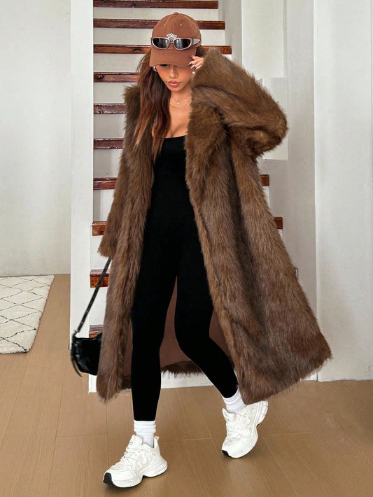 woman wearing long grey faux fur coat winter jacket Nushes 