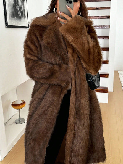 woman wearing long grey faux fur coat winter jacket Nushes 
