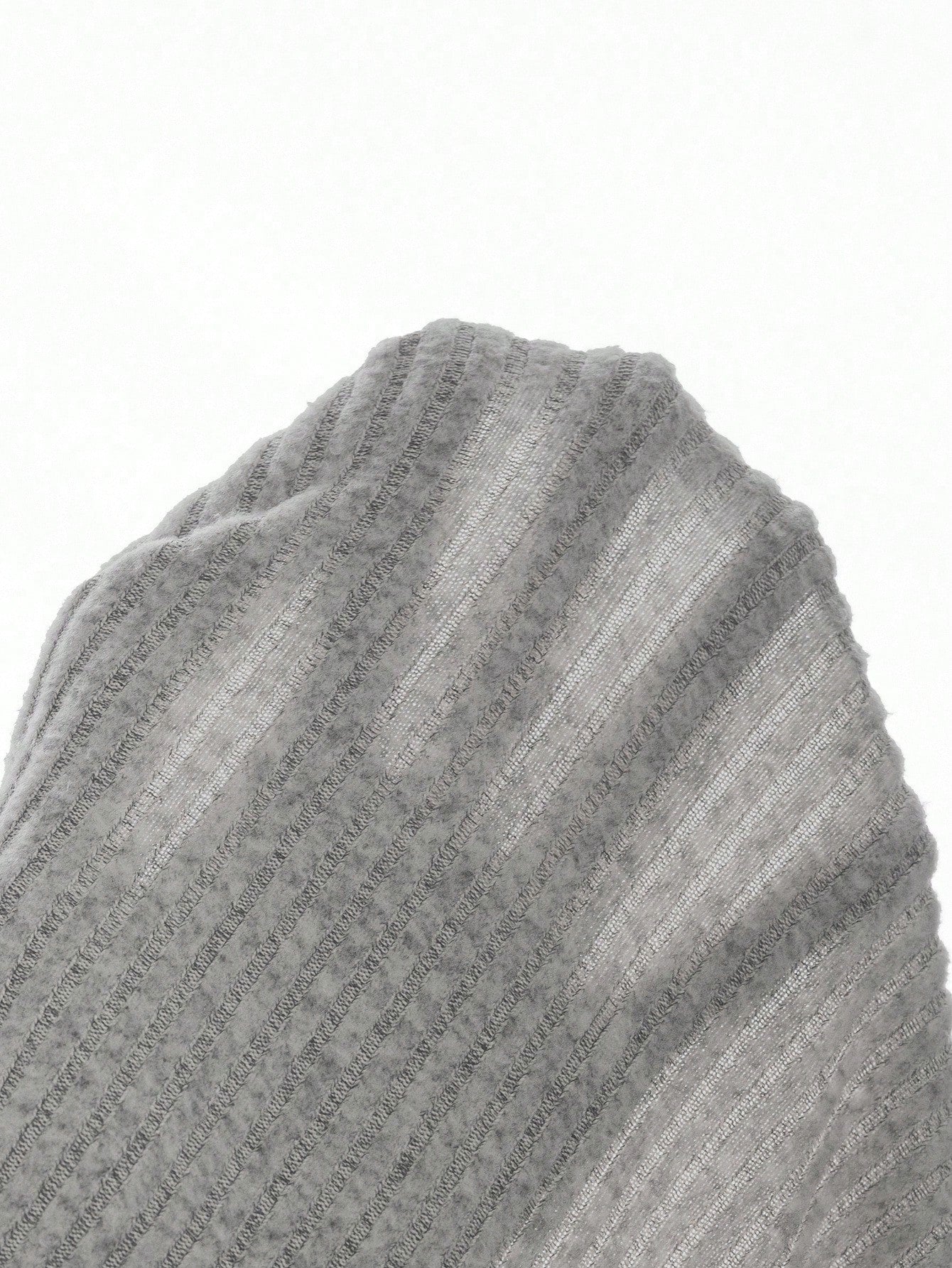 Woman taking a mirror selfie wearing a gray knit dress with a white collar, holding a pink phone. Nushes