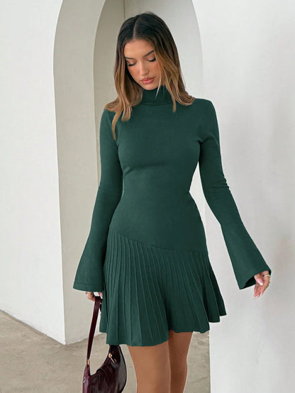 Woman wearing long turtleneck knitted dress facing forward