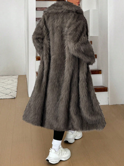 woman wearing long grey faux fur coat winter jacket Nushes 