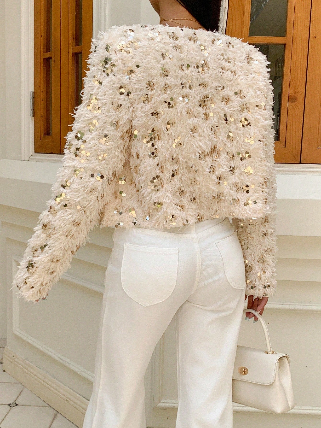 Elegant cropped faux fur coat with sequins Nushes 