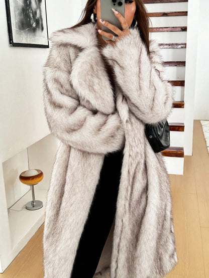 woman wearing long grey faux fur coat winter jacket Nushes 